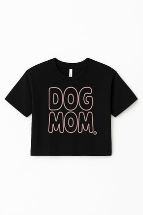 Show your love for your pup with the Oversized Dog Mom Crop Top from Dogloverclothing.com—a black, relaxed fit cotton crop top featuring bold, outlined DOG MOM lettering on the front.