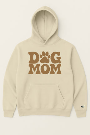 The Dog Mom Hoodie by Dogloverclothing.com is a beige hoodie with a front pocket, hood, large brown Dog Mom text, and a paw-print replacing the O in DOG.