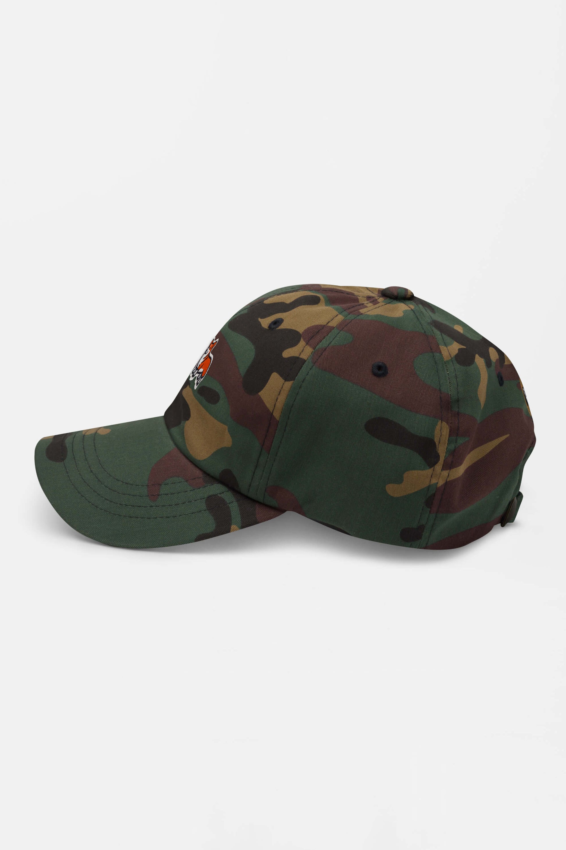The Iconic Corgi Cap by Dogloverclothing.com features green, brown, and black camouflage and is shown in side profile against a white background—ideal for adding cute flair to your dogs headgear collection.