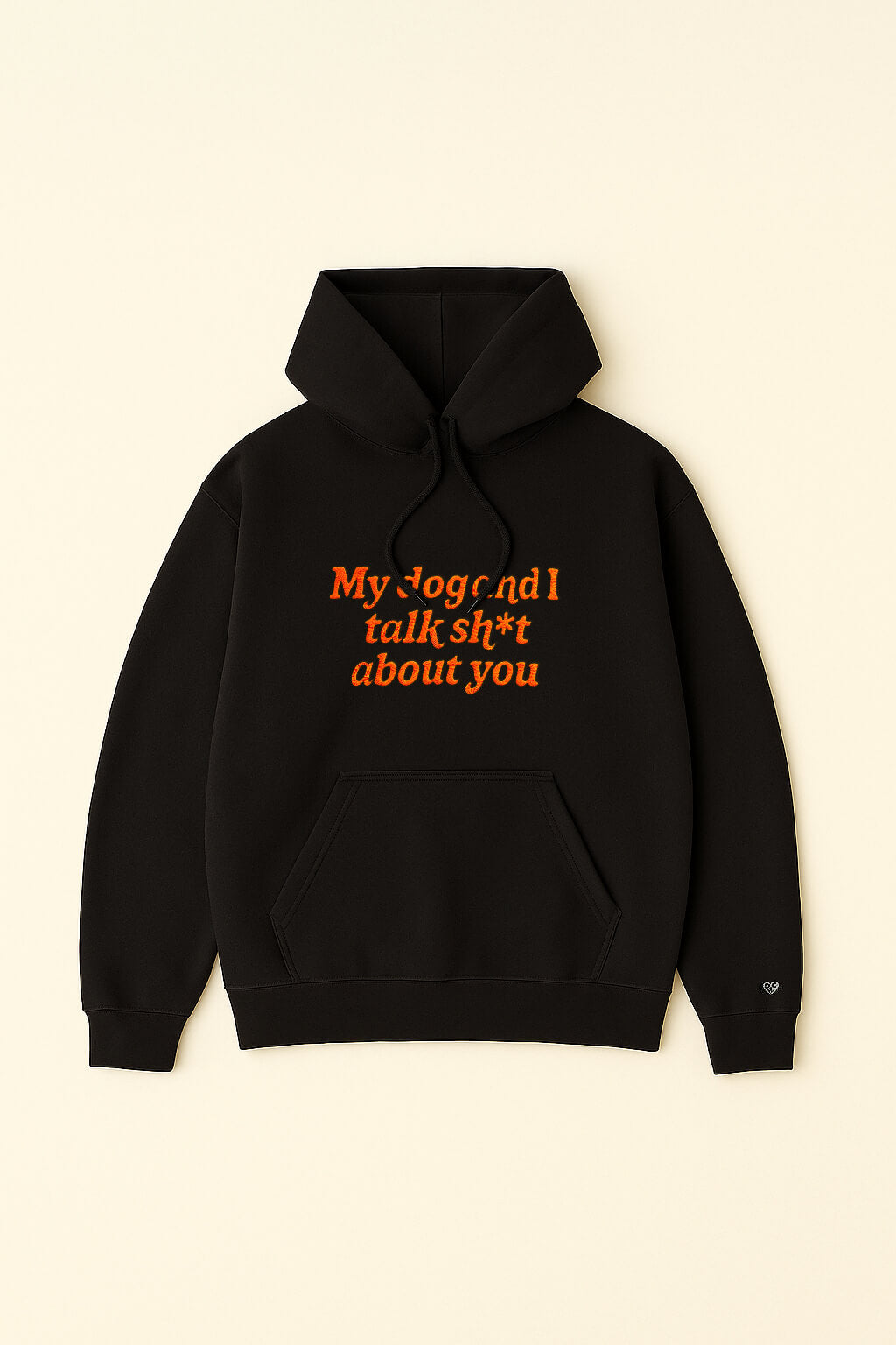 The Bold My Dog And I Talk Embroidered Hoodie by Dogloverclothing.com is a black hoodie made from premium fabric, featuring a front pocket and orange embroidery reading My dog and I talk sh*t about you, shown on a plain light background.