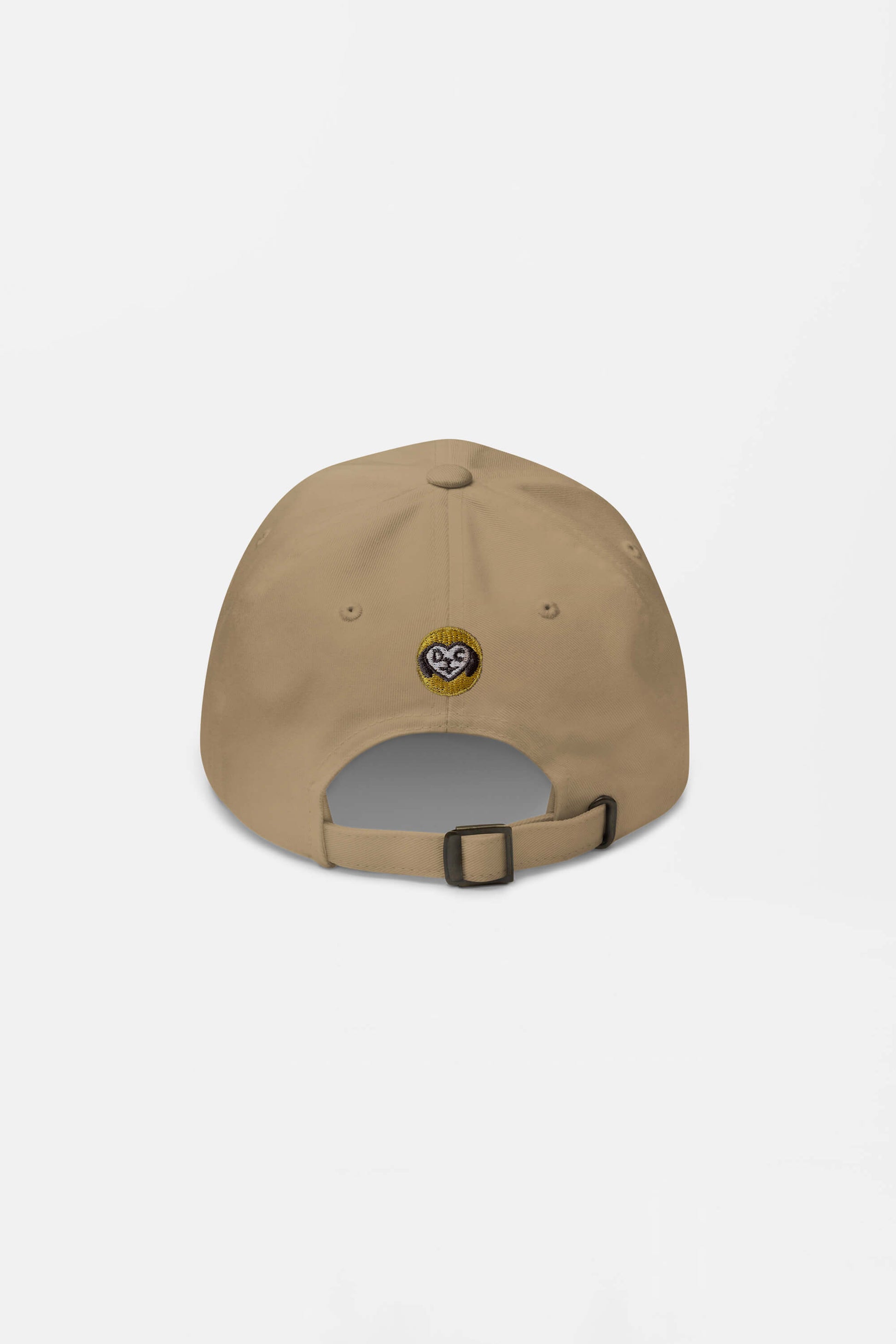 The Iconic Corgi Cap from Dogloverclothing.com is a beige baseball cap with an adjustable strap and a cute corgi face patch above the back opening—ideal for dog lovers and hat enthusiasts alike.