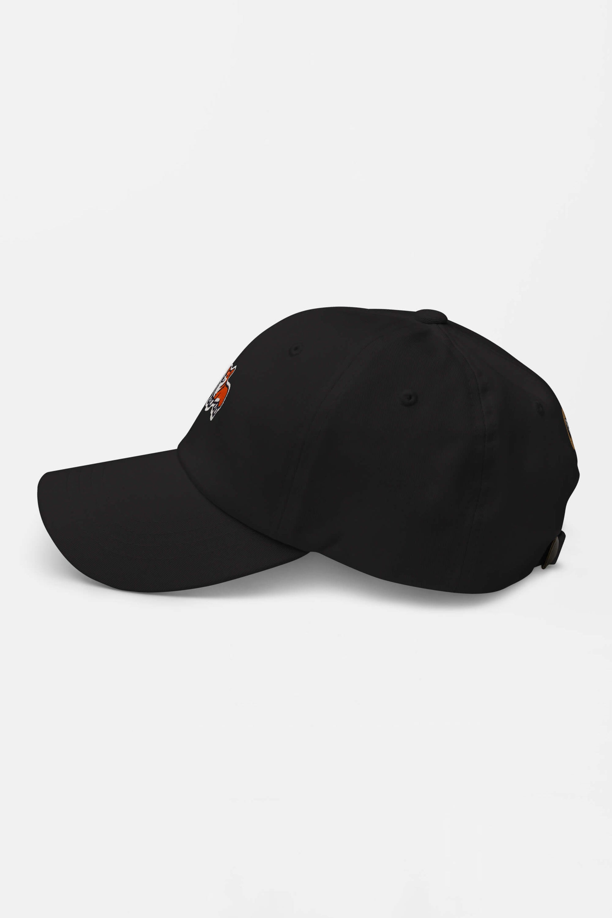 The Iconic Corgi Cap from Dogloverclothing.com is displayed in side view against a white background, featuring a small, colorful embroidered design on the front that hints at corgi charm.